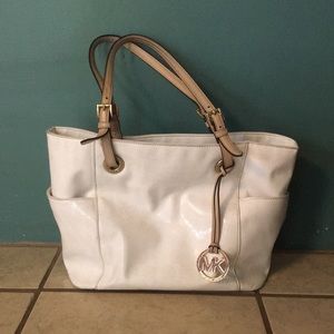 Well loved Michael Kors patent leather white tote.